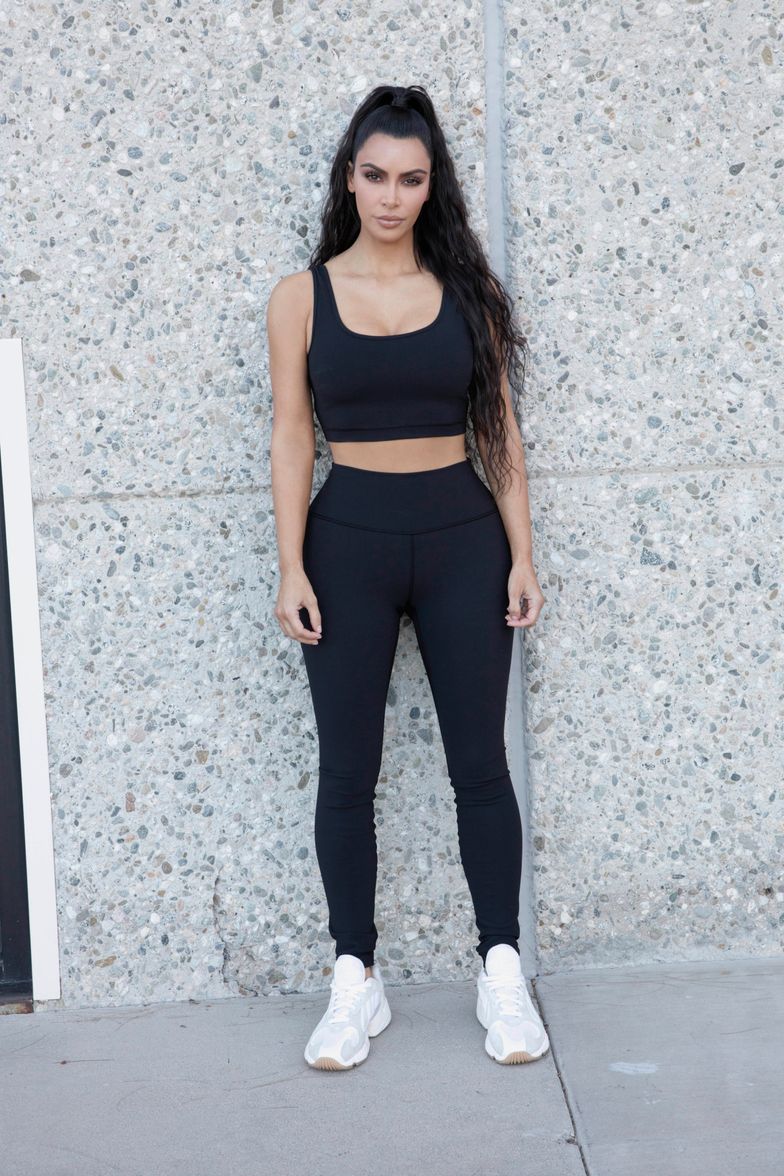 Kim Kardashian in black crop top and black leggings on March 2 ~ I