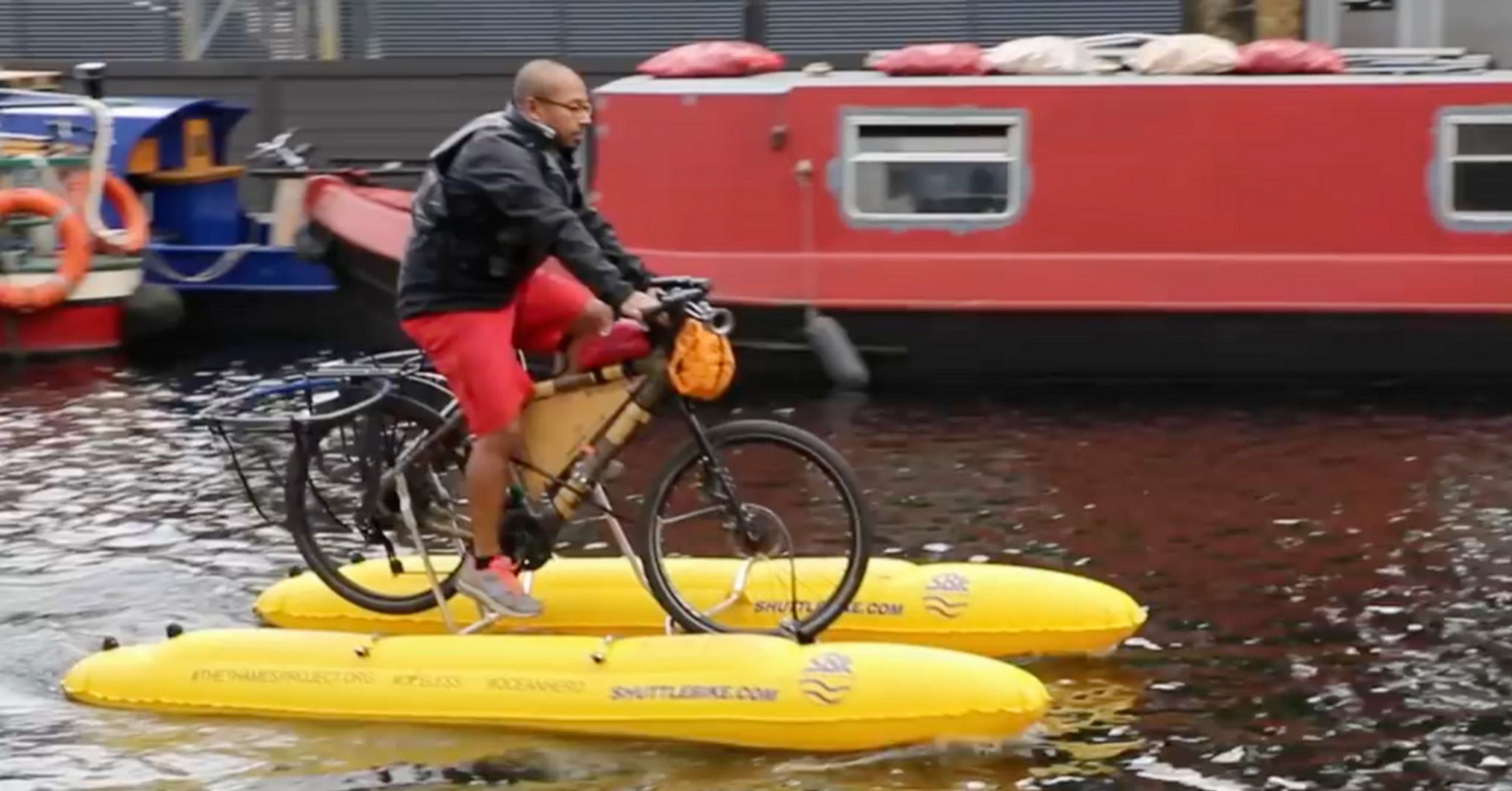 Man Quits Desk Job To Ride Floating Bicycle Cleaning Up Plastic