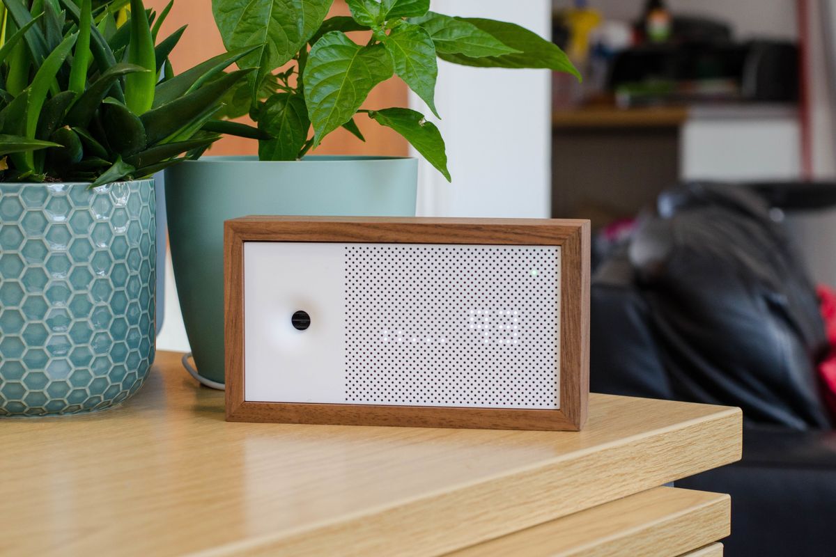 a photo of Awair Element Indoor Air Quality Monitor on an end table