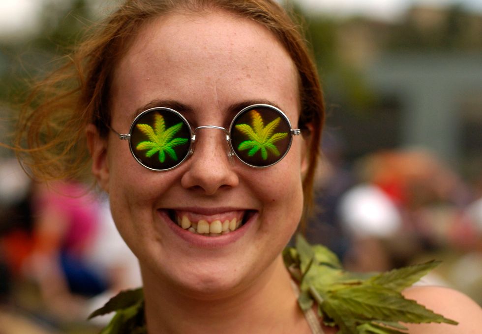Girl with psychedelic weed glasses.