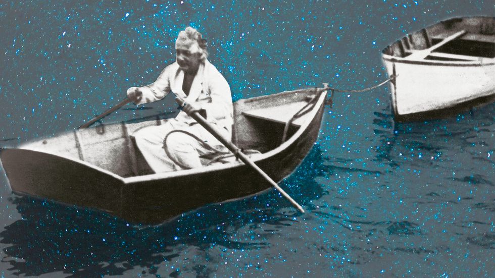 Albert Einstein in a rowing boat circa 1930. (Photo by Imagno/Getty Images)