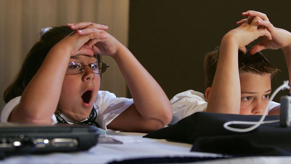 School kids yawning (Photo by Joe Raedle/Getty Images).