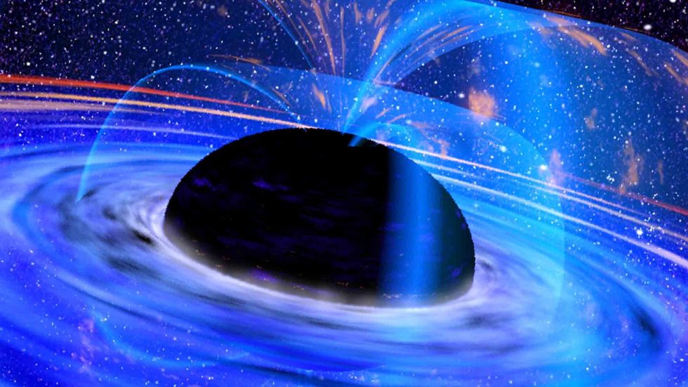 This the European Space Agency photograph released October 25, 2001 shows a supermassive black hole in the core of galaxy named MCG-6-30-15 as seen through the X-ray Multi-Mirror Mission (XMM-Newton) satellite. (ESA/Getty Images)
