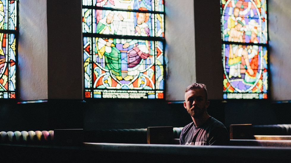 At church alone. Photo by Karl Fredrickson on Unsplash.