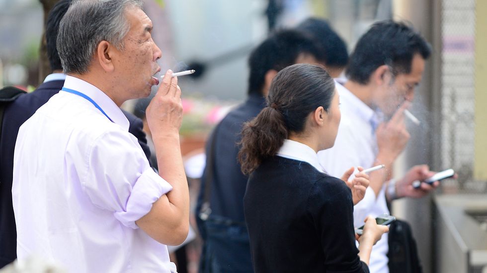 Japanese people smoking Photo Toru Yamanaka / Getty Images