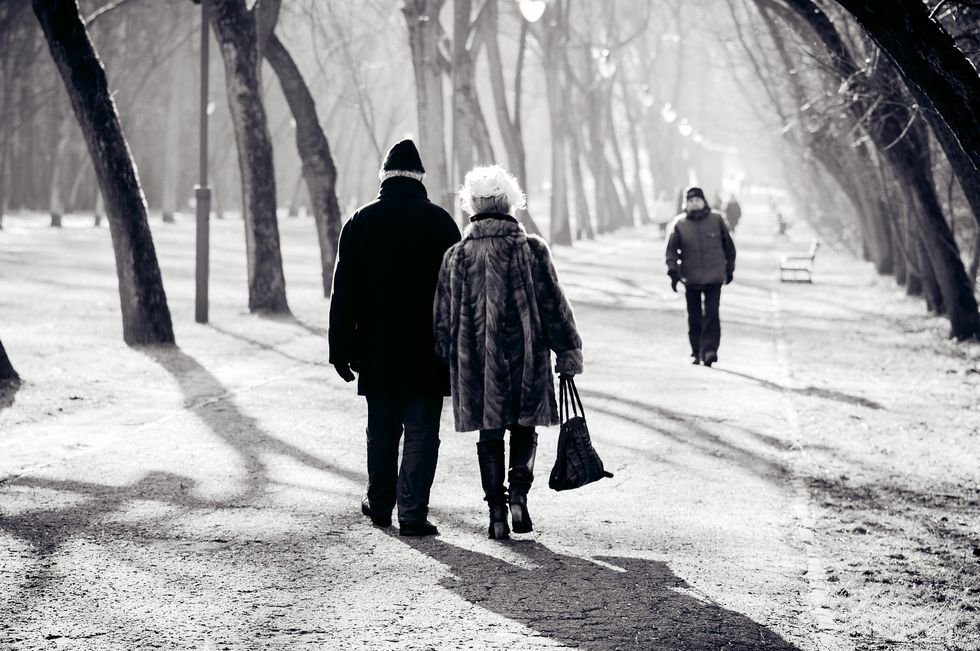 An elderly couple.