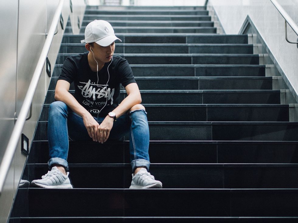 Man sitting on the steps.