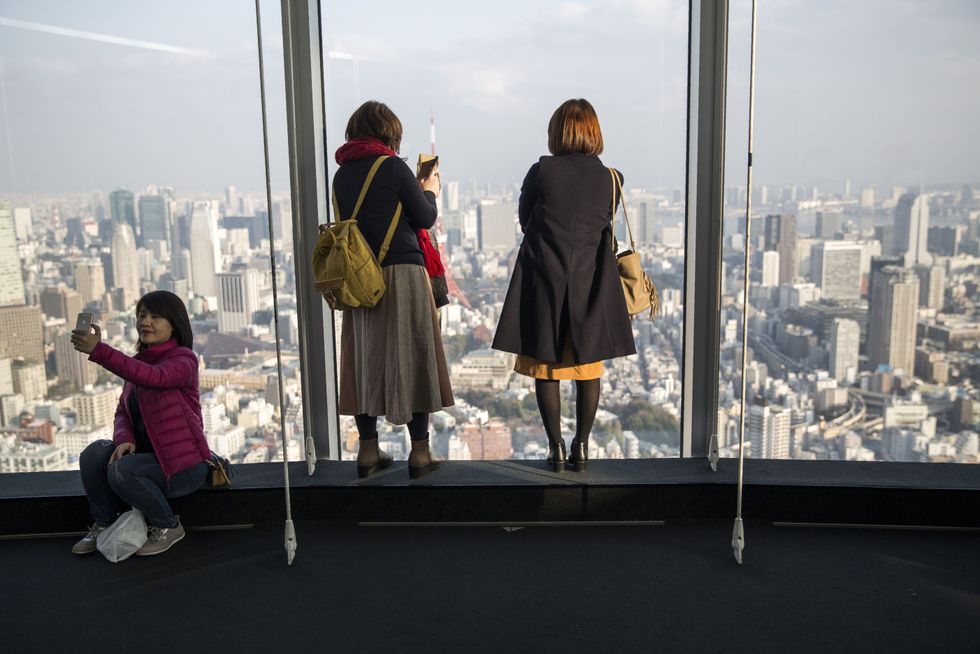Visitors inside the Tokyo Metropolitan Government Building.