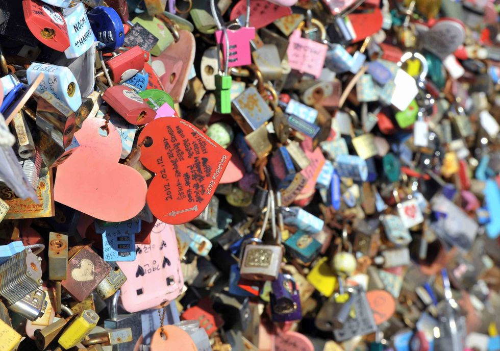 Thousands of 'locks of love' hang on the wall of a terrace of the N Seoul Tower on the top of Nam mountain in Seoul. (JUNG YEON-JE/AFP/Getty Images)