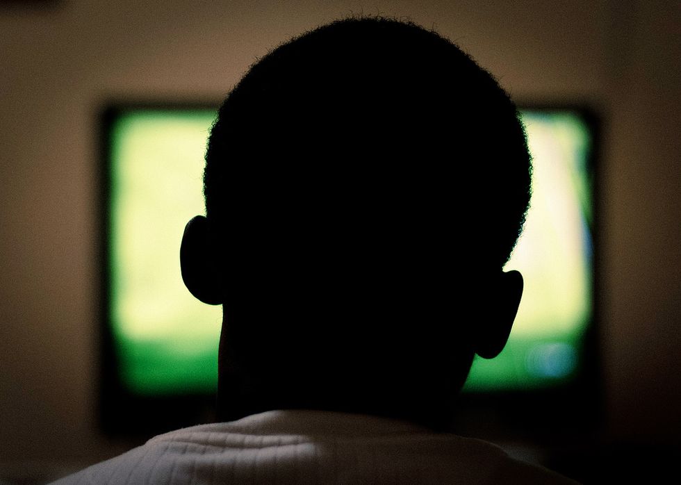 man watching TV