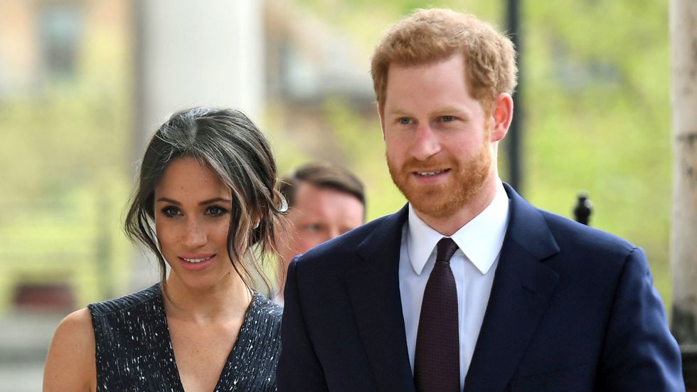 Britain's Prince Harry (R) and his US fiancee Meghan Markle arrive to attend a memorial service at St Martin-in-the-Fields in Trafalgar Square in London. (Photo: VICTORIA JONES/AFP/Getty Images)