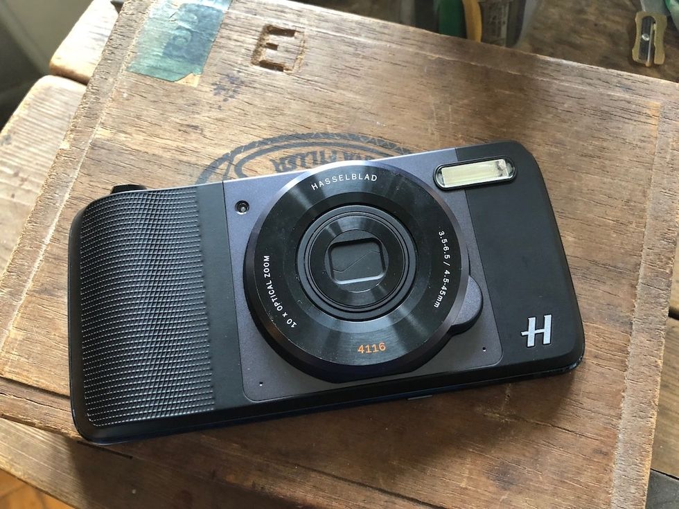 Photo of Hasselblad True Zoom for Moto Z Play smartphone on a table.