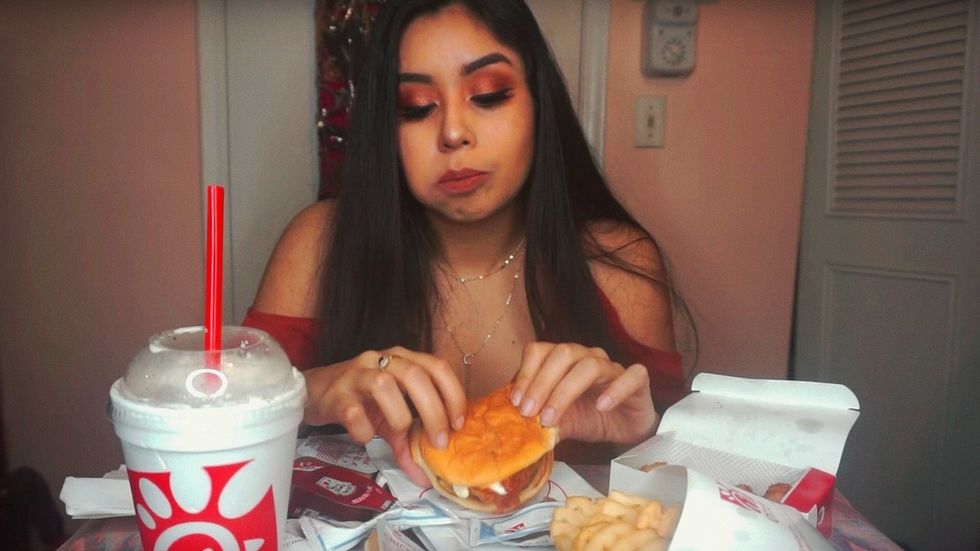 woman eating chick-fil-a food