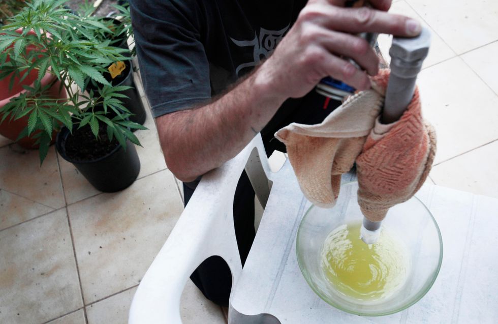 Medical marijuana advocate in Spain makes cannabis oil.