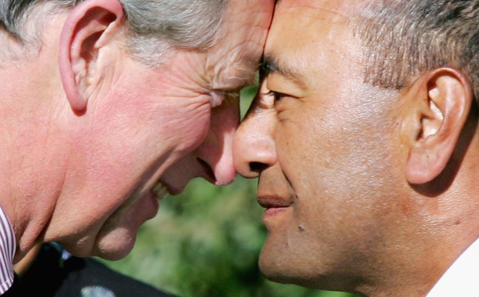 Narrow vs. wide nostrils on display as Britain's Prince Charles performs a traditional Maori 'hongi', a greeting where two people press noses, with Lieutenant Donald Ripia, of the Royal New Zealand Navy.