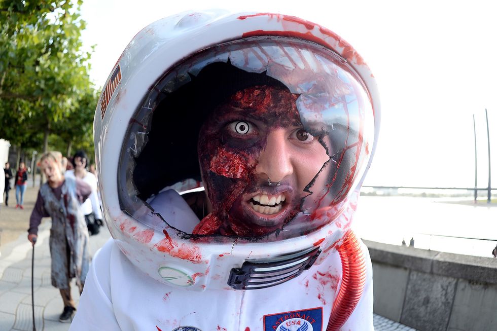 man in zombie spaceman outfit