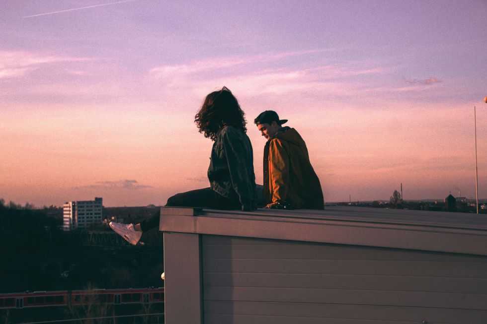 boy and girl on roof top