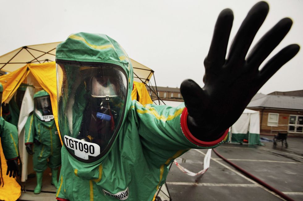 man in contamination suit