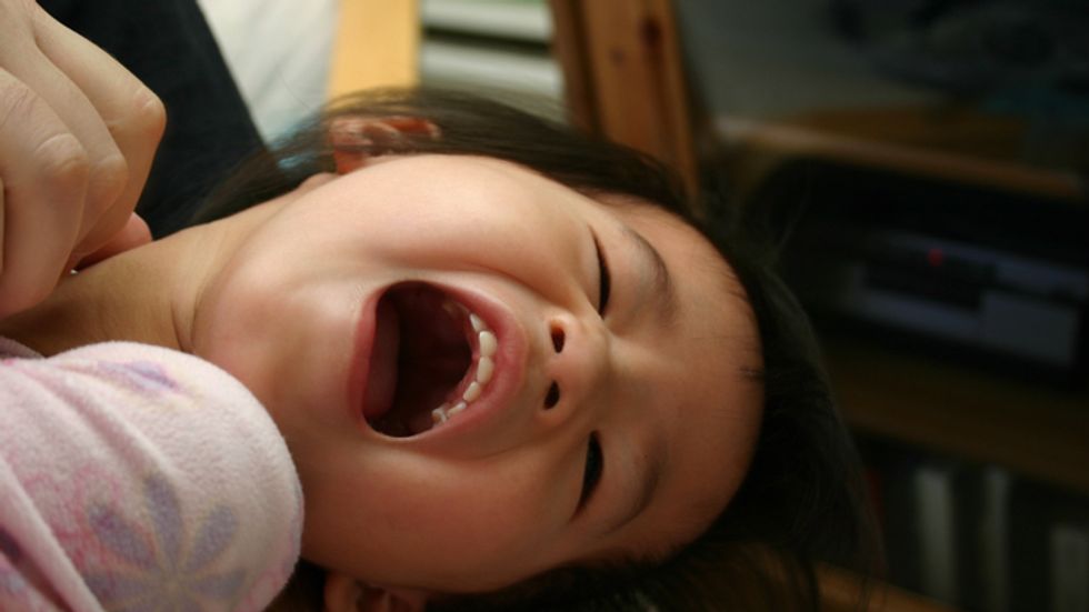 A girl being tickled