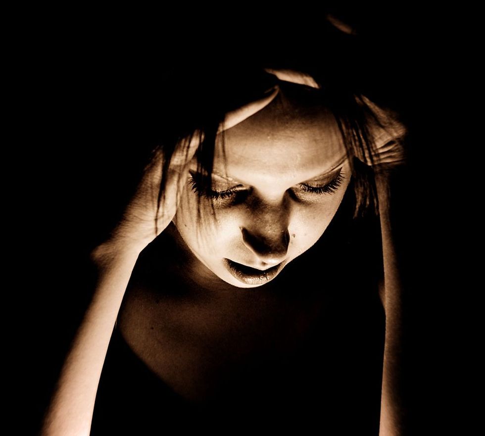 Girl with a migraine.