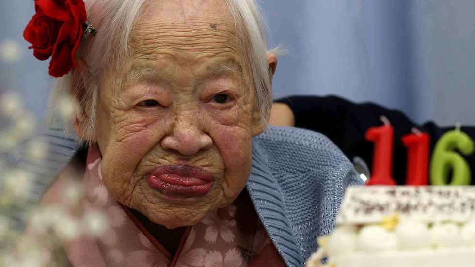 Misao Okawa, the world's oldest Japanese woman looks on her 116th birthday celebration on March 5, 2014 in Osaka, Japan. (Photo by Buddhika Weerasinghe/Getty Images)