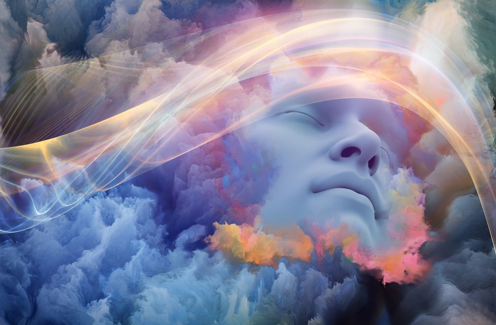 A face in the clouds, with fractal patterns surrounding it to give the sense of mysticism.