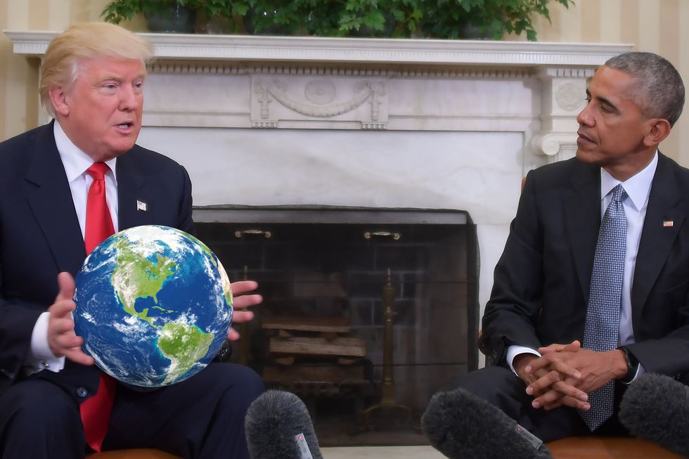 Donald Trump with the world in his hands.