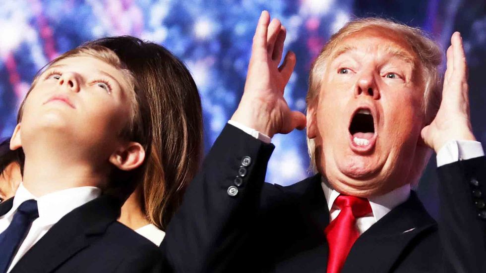Donald Trump reacts as his son Barron Trump looks on. Photo by Chip Somodevilla/Getty Images
