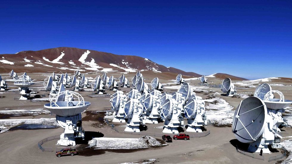 Aerial picture of Radio telescope antennas of the ALMA project in the Chajnantor plateau, Atacama desert, some 1500 km north of Santiago, Chile. (ARIEL MARINKOVIC/AFP/Getty Images)
