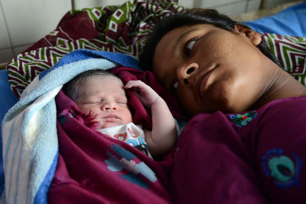 Woman with her newborn.