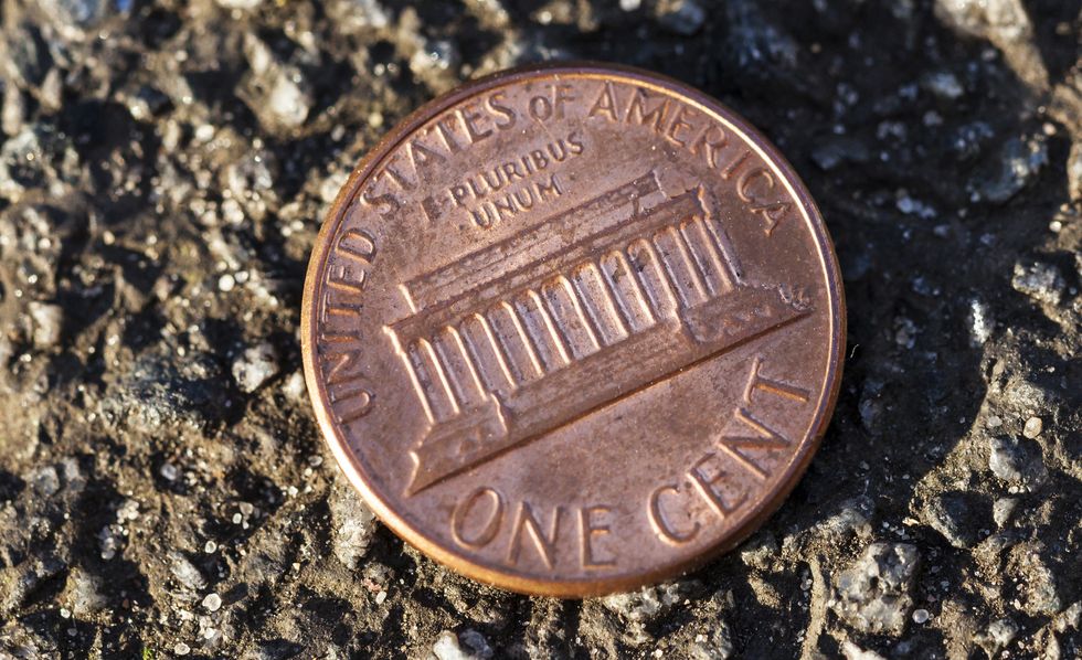 A penny on the ground.