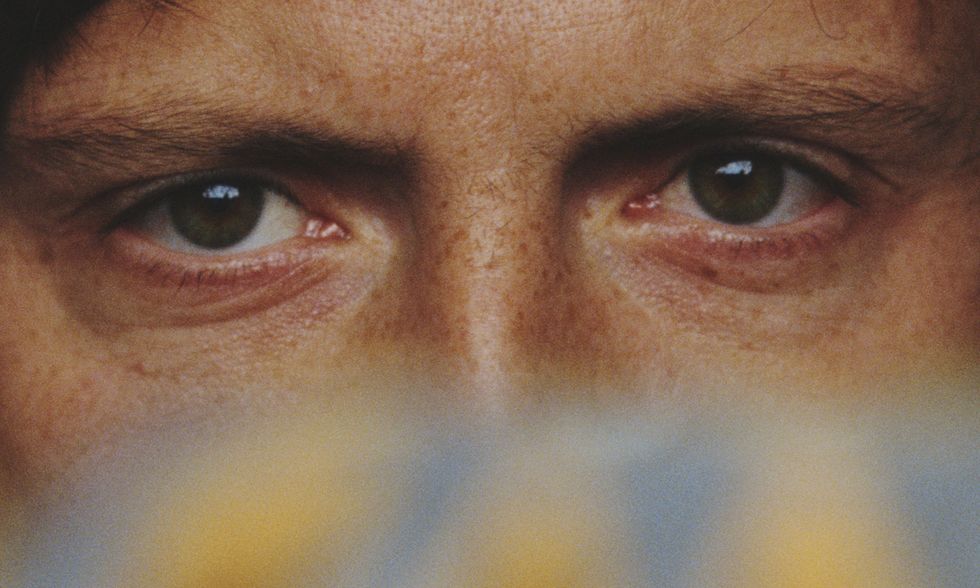 A set of eyes staring out at us.