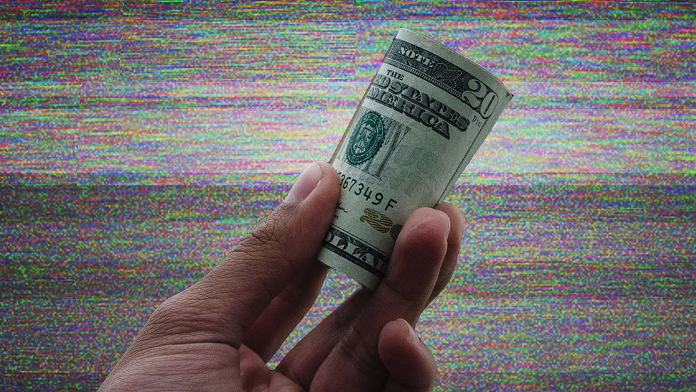 A roll of money, paying to access content