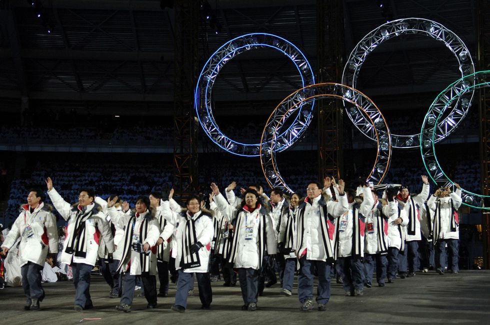 North and South Koreans march together at the 2006 Winter Olympics in Turin, Italy.