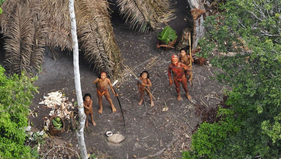 An uncontacted tribe in Brazil notices they are being watched. (Copyright to Gleilson Miranda/Governo do Acre)