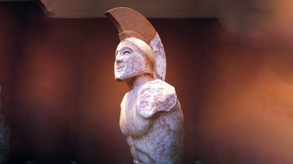 A statue of a greek solder