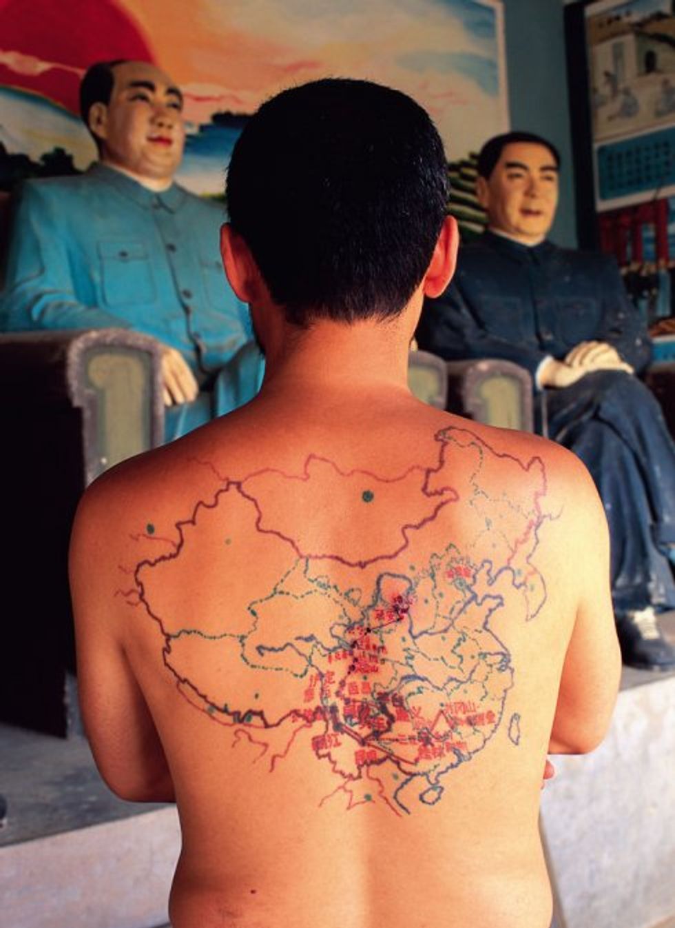 556 The World On Your Shoulders Map Tattoos Big Think