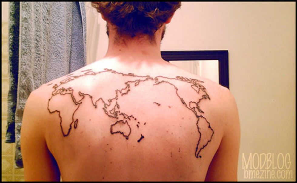 556 The World On Your Shoulders Map Tattoos Big Think