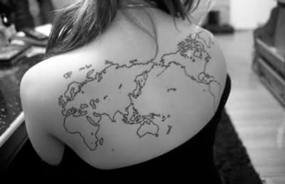 556 The World On Your Shoulders Map Tattoos Big Think