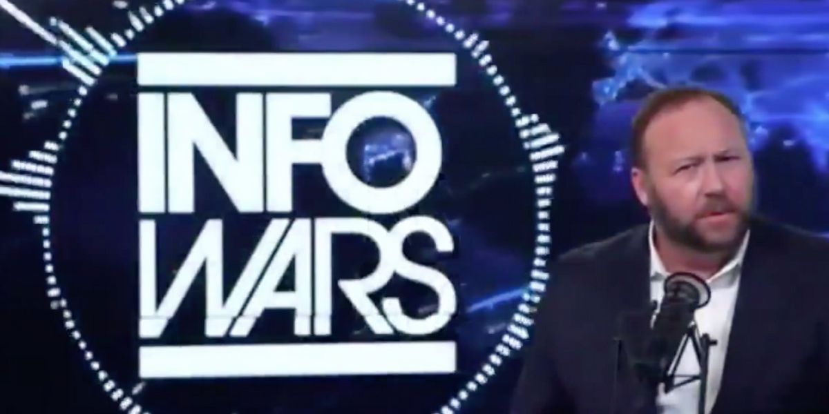 Alex Jones Accidentally Shows Porn On His Phone During 'InfoWars'—Porn