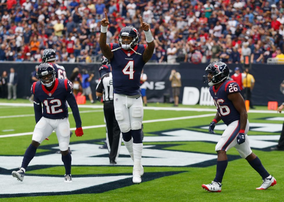 Texans finally find a quarterback — and a play caller — in 57-14 rout of Titans