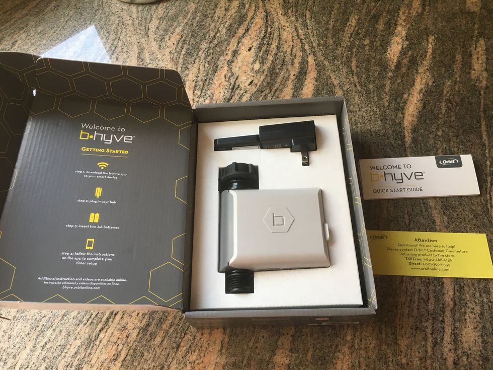 Picture of inside of box for Orbit B-hyve Smart Hose Faucet timer with Wi-Fi hub.