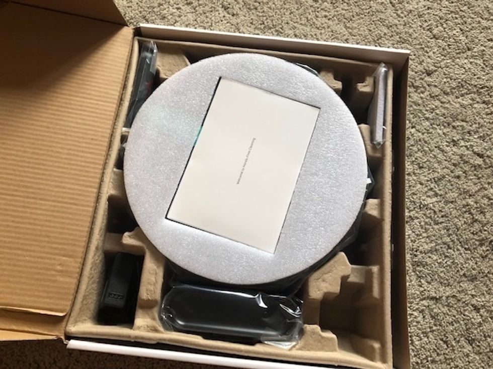 a photo of eufy RoboVac 11S unboxed