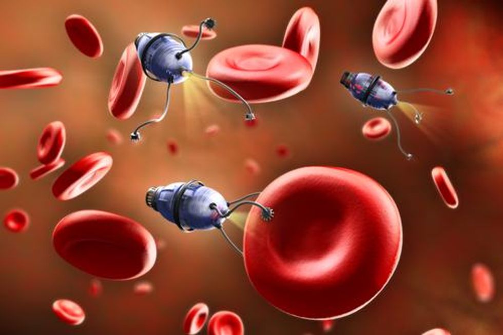 Nanorobots Order Cancer Cells to Commit Suicide