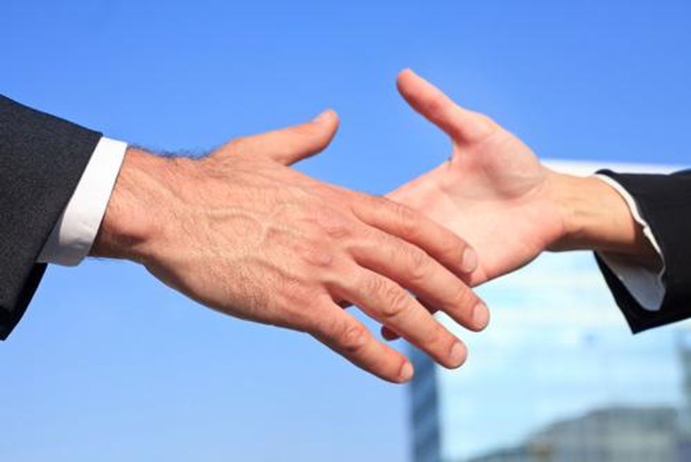 Why Your Brain Likes a Good Handshake - Big Think