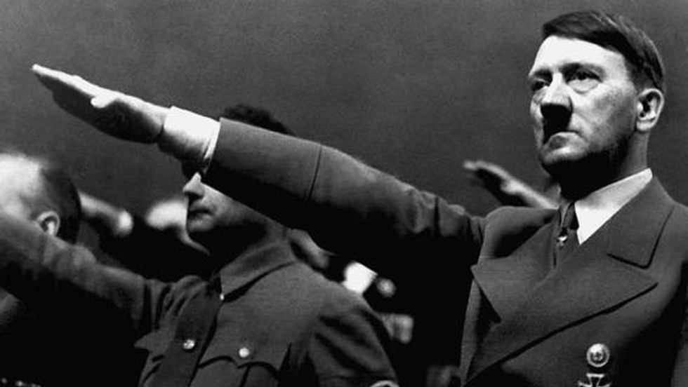 Adolf Hitler giving his signature salute