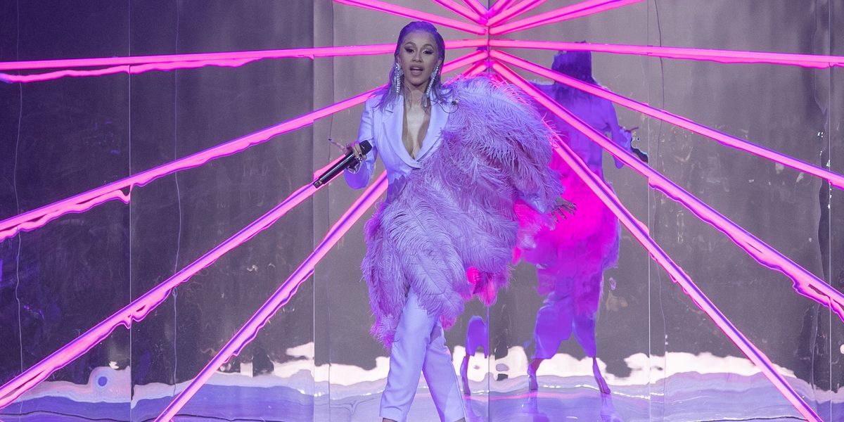 Cardi B Flies Away in Feathered Christian Cowan Suit