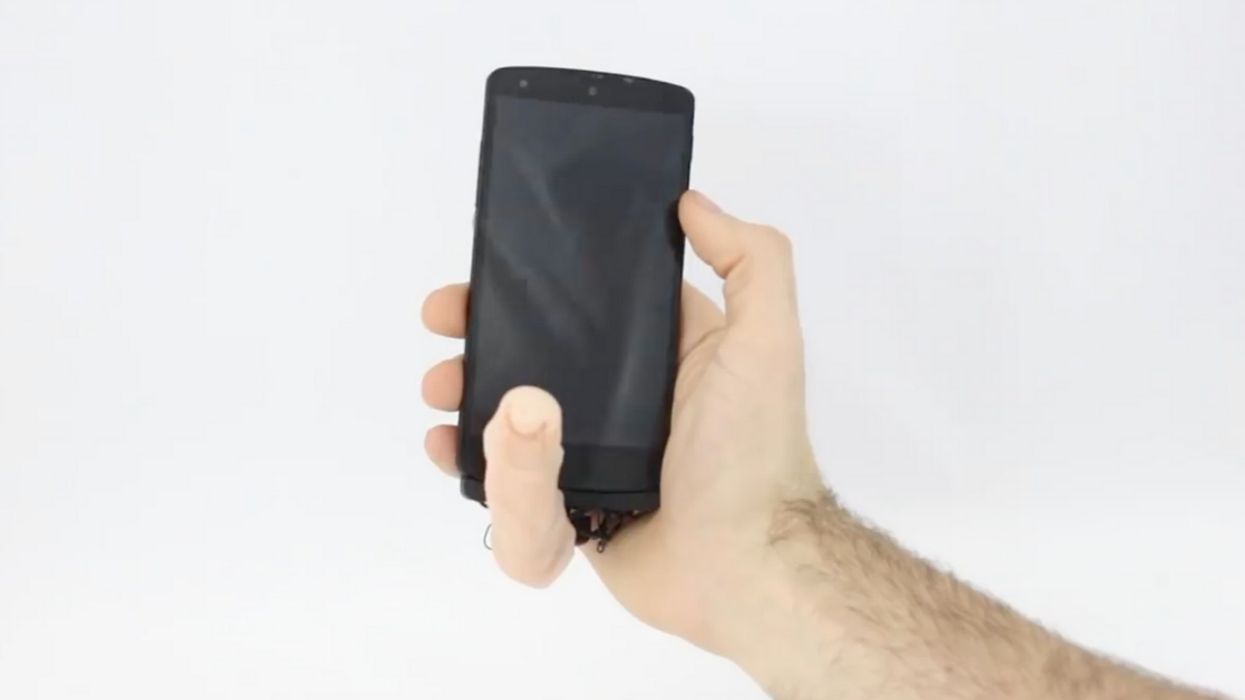 This Creepy Robot Phone Attachment Moves Just Like A Real Human Finger