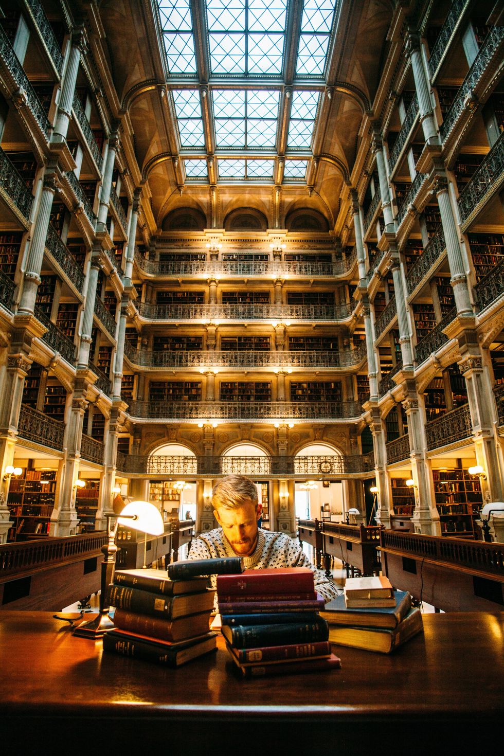 man studying in a library