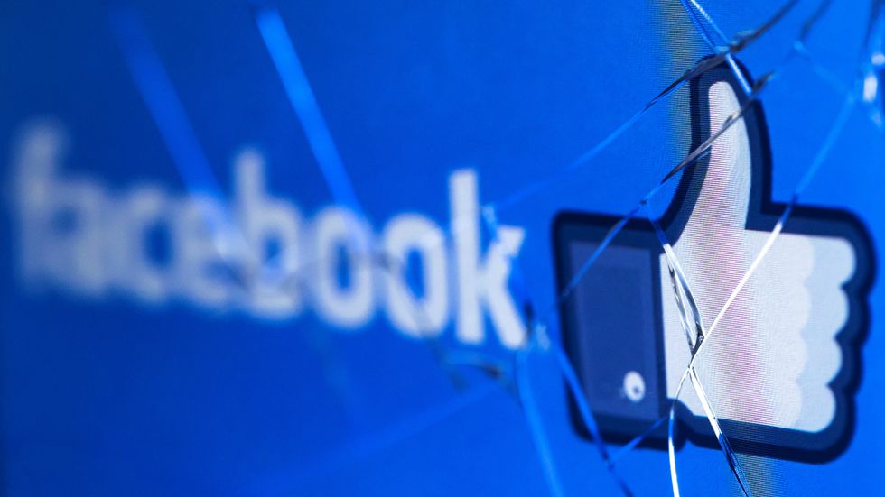 A broken Facebook 'like' symbol. Photo: JOEL SAGET/AFP/Getty Images